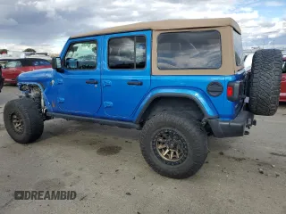 2021 Jeep Wrangler Unlimited Sahara High Altitude with VIN 1C4HJXEM3MW770622, listed as a Copart auction lot 76144874 with 71,886 mi miles and Salvage title. Bid and sale history available at DreamBid. Image 2.