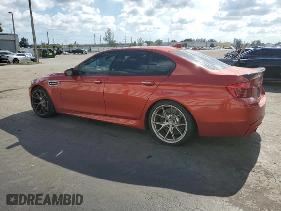 2014 BMW M5 z VIN WBSFV9C58ED097898, wystawiony jako Copart lot #86151234 z przebiegiem 60 470 mil mil oraz Tytuł czysty. Historia ofert i sprzedaży dostępna na DreamBid. Obrazek 2.