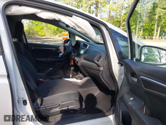 2015 Honda Fit LX with VIN 3HGGK5H50FM772396, listed as a IAAI auction lot 42112723 with 125,419 mi miles and . Bid and sale history available at DreamBid. Image 5.