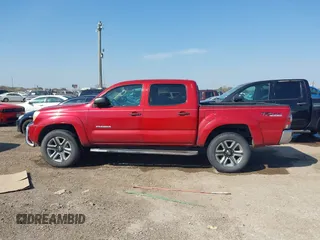 2009 Toyota Tacoma PreRunner with VIN 3TMJU62N69M086123, listed as a IAAI auction lot 41693360 with 221,033 mi miles. Bid and sale history available at carsss.com. Image 13.