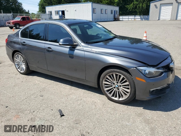 2015 BMW 3 Series 328i xDrive with VIN WBA3B3C5XFJ985147, listed as a Copart auction lot 59819905 with 113,492 mi miles and Salvage title. Bid and sale history available at DreamBid. Image 4.