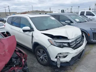 2018 Honda Pilot EX-L with VIN 5FNYF5H58JB029702, listed as a IAAI auction lot 41920659 with 43,851 mi miles. Bid and sale history available at carsss.com. Image 1.