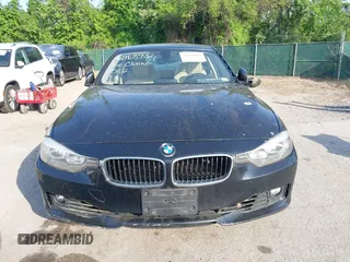 2014 BMW 3 Series 328i xDrive with VIN WBA3B5G56ENS06890, listed as a IAAI auction lot 42168982 with 133,664 mi miles. Bid and sale history available at carsss.com. Image 12.