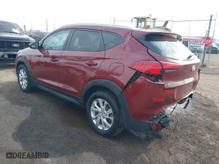 2019 Hyundai Tucson Value with VIN KM8J33A42KU861329, listed as a IAAI auction lot 41679185 with 65,304 mi miles. Bid and sale history available at carsss.com. Image 3.