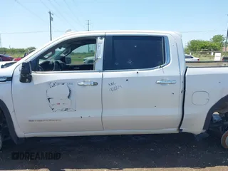 2021 GMC Sierra 1500 SLT z VIN 3GTU9DED2MG439731, wystawiony jako IAAI lot #42014277 z przebiegiem Nie podano mil oraz . Historia ofert i sprzedaży dostępna na DreamBid. Obrazek 13.