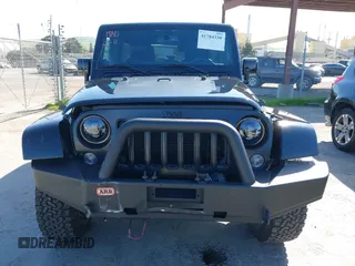 2014 Jeep Wrangler Unlimited Sahara with VIN 1C4BJWEG0EL306202, listed as a IAAI auction lot 41784330 with 79,123 mi miles. Bid and sale history available at carsss.com. Image 12.