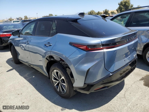 2023 Lexus RZ with VIN JTJAAAAB3PA000731, listed as a Copart auction lot 57350214 with 7,642 mi miles and Salvage Title. Bid and sale history available at carsss.com. Image 2.