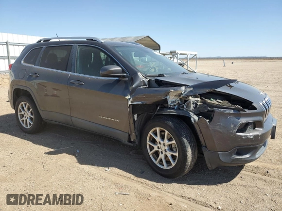 2015 Jeep Cherokee Latitude z VIN 1C4PJMCB2FW734385, wystawiony jako Copart lot #57333805 z przebiegiem 121 249 mil mil oraz Szkoda całkowita • Salvage title. Historia ofert i sprzedaży dostępna na DreamBid. Obrazek 4.