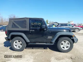 2014 Jeep Wrangler Sport with VIN 1C4AJWAGXEL319749, listed as a IAAI auction lot 41752779 with 140,045 mi miles and . Bid and sale history available at DreamBid. Image 13.