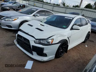 2011 Mitsubishi Lancer Evolution GSR with VIN JA32W8FV4BU033621, listed as a Copart auction lot 71182174 with 129,131 mi miles and Salvage Title. Bid and sale history available at carsss.com. Image 1.