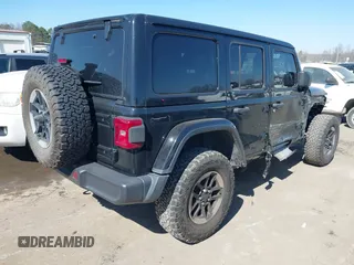 2019 Jeep Wrangler Unlimited Rubicon with VIN 1C4HJXFN1KW679028, listed as a IAAI auction lot 41654887 with 32,247 mi miles and . Bid and sale history available at DreamBid. Image 4.