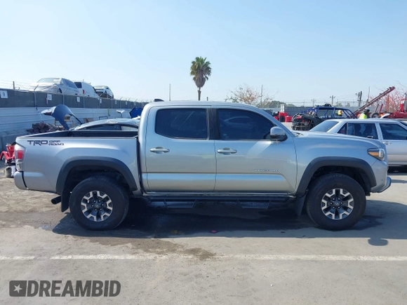 2020 Toyota Tacoma SR5 with VIN 3TMAZ5CN7LM138859, listed as a IAAI auction lot 42150725 with 36,462 mi miles and . Bid and sale history available at DreamBid. Image 13.