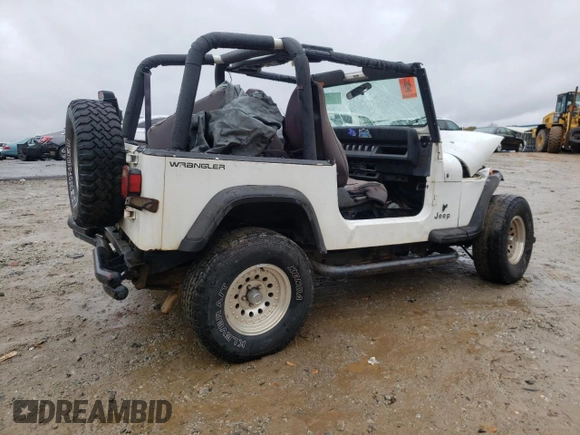 1995 Jeep Wrangler S with VIN 1J4FY19P7SP205053, listed as a Copart auction lot 84003534 with 215,769 mi miles and Salvage Title. Bid and sale history available at carsss.com. Image 3.