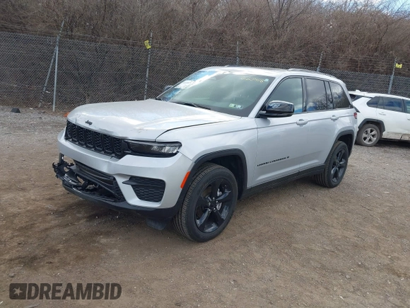 2023 Jeep Grand Cherokee Laredo with VIN 1C4RJHAG2PC660418, listed as a IAAI auction lot 41693879 with 4,295 mi miles and . Bid and sale history available at DreamBid. Image 2.