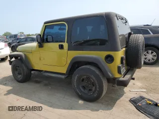 2003 Jeep Wrangler Sahara with VIN 1J4FA59S03P313418, listed as a Copart auction lot 64883094 with 184,658 mi miles and Salvage title. Bid and sale history available at DreamBid. Image 2.
