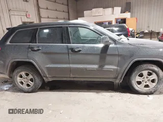 2017 Jeep Grand Cherokee Laredo with VIN 1C4RJFAG6HC661836, listed as a IAAI auction lot 41622814 with 134,509 mi miles. Bid and sale history available at carsss.com. Image 13.