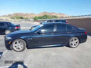 2015 BMW 5 Series 550i with VIN WBAKN9C56FD961027, listed as a IAAI auction lot 42653452 with 167,493 mi miles and . Bid and sale history available at DreamBid. Image 14.