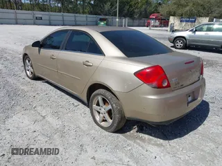 2005 Pontiac G6 with VIN 1G2ZG528754143549, listed as a IAAI auction lot 41726420 with 243,882 mi miles. Bid and sale history available at carsss.com. Image 3.