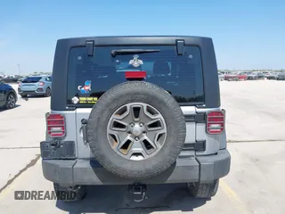 2014 Jeep Wrangler Sport with VIN 1C4AJWAG9EL155409, listed as a IAAI auction lot 41869906 with 102,400 mi miles and . Bid and sale history available at carsss.com. Image 17.