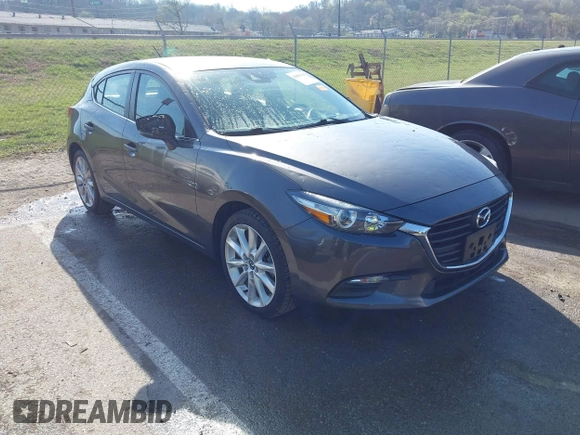 2017 Mazda 3 Touring with VIN 3MZBN1L70HM102817, listed as a IAAI auction lot 41867063 with 100,307 mi miles and . Bid and sale history available at DreamBid. Image 1.