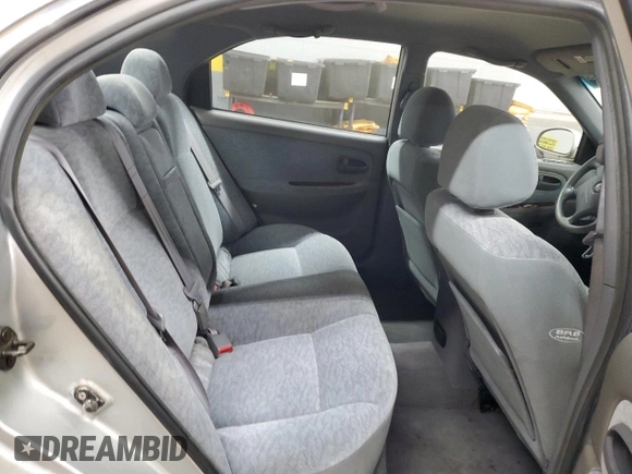 2005 Kia Optima LX z VIN KNAGD128155423463, wystawiony jako Copart lot #87441284 z przebiegiem 143 193 mil mil oraz Szkoda całkowita • Salvage title. Historia ofert i sprzedaży dostępna na DreamBid. Obrazek 10.