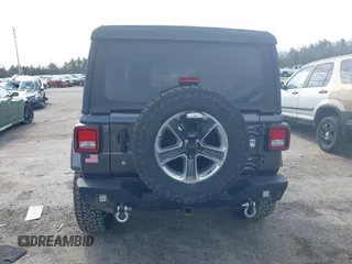 2018 Jeep Wrangler Unlimited Sahara with VIN 1C4HJXEG0JW246110, listed as a IAAI auction lot 41826662 with 65,236 mi miles. Bid and sale history available at carsss.com. Image 16.