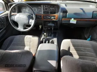 1997 Jeep Grand Cherokee Laredo with VIN 1J4GZ58S1VC747713, listed as a Copart auction lot 55290275 with 159,846 mi miles and Salvage title. Bid and sale history available at DreamBid. Image 8.
