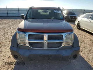 2007 Dodge Nitro SXT with VIN 1D8GU28K87W728744, listed as a Copart auction lot 77082954 with 245,632 mi miles and Salvage title. Bid and sale history available at DreamBid. Image 5.