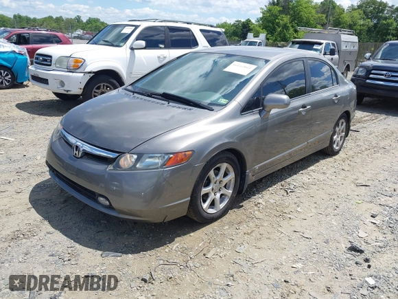 2006 Honda Civic LX with VIN 1HGFA16586L104230, listed as a IAAI auction lot 42215822 with 128,704 mi miles and . Bid and sale history available at DreamBid. Image 2.