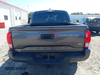 2017 Toyota Tacoma SR5 with VIN 5TFAZ5CN7HX033594, listed as a IAAI auction lot 41881117 with 86,676 mi miles and . Bid and sale history available at DreamBid. Image 16.
