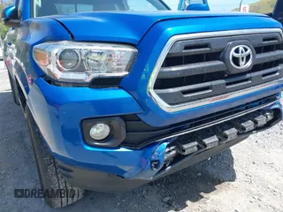 2016 Toyota Tacoma SR z VIN 5TFRX5GN0GX073033, wystawiony jako IAAI lot #42108157 z przebiegiem 179 019 mil mil oraz . Historia ofert i sprzedaży dostępna na DreamBid. Obrazek 6.