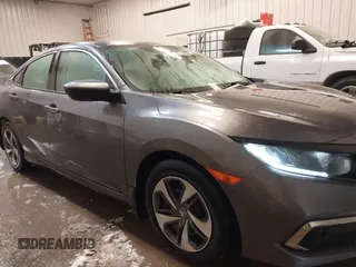2020 Honda Civic LX z VIN 19XFC2F65LE030888, wystawiony jako IAAI lot #41609630 z przebiegiem 115 614 mil mil oraz . Historia ofert i sprzedaży dostępna na DreamBid. Obrazek 13.