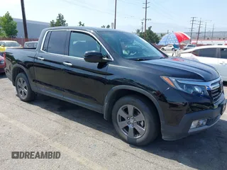 2020 Honda Ridgeline RTL-E with VIN 5FPYK3F70LB009376, listed as a IAAI auction lot 42488529 with 30,932 mi miles and . Bid and sale history available at DreamBid. Image 1.