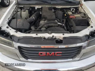 2010 GMC Canyon z VIN 1GTCSBD90A8149782, wystawiony jako Copart lot #74656504 z przebiegiem 242 911 mil mil oraz Szkoda całkowita • Salvage title. Historia ofert i sprzedaży dostępna na DreamBid. Obrazek 11.