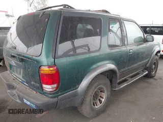 1999 Ford Explorer with VIN 1FMYU22E1XUC26302, listed as a IAAI auction lot 42163852 with 158,910 mi miles and . Bid and sale history available at DreamBid. Image 4.