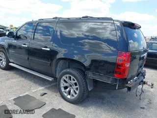 2014 Chevrolet Suburban LS with VIN 1GNSCHE07ER173936, listed as a IAAI auction lot 41967144 with 128,869 mi miles. Bid and sale history available at carsss.com. Image 3.