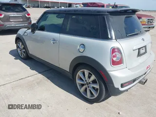 2013 MINI Hardtop S with VIN WMWSV3C54DT476756, listed as a IAAI auction lot 42691529 with 130,877 mi miles and . Bid and sale history available at DreamBid. Image 3.