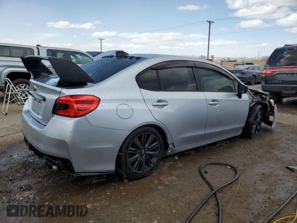 2015 Subaru WRX with VIN JF1VA1A65F9824808, listed as a Copart auction lot 48007615 with 104,090 mi miles and Salvage Title. Bid and sale history available at carsss.com. Image 3.