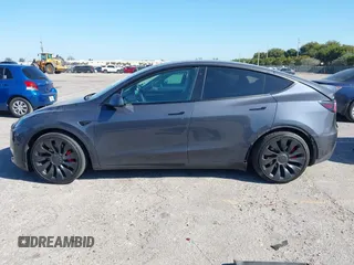 2022 Tesla Model Y Performance with VIN 7SAYGDEF6NF540094, listed as a IAAI auction lot 41786865 with 28,356 mi miles and . Bid and sale history available at DreamBid. Image 14.