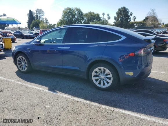 2018 Tesla Model X 75D with VIN 5YJXCBE22JF111938, listed as a Copart auction lot 47000303 with 63,430 mi miles. Bid and sale history available at carsss.com. Image 2.
