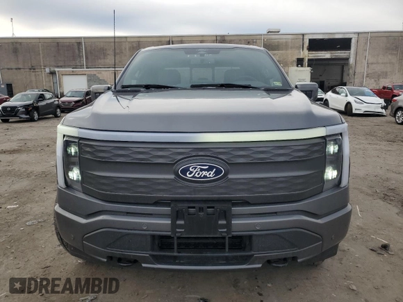 2024 Ford F-150 Lightning Lariat with VIN 1FT6W5L79RWG19060, listed as a Copart auction lot 43415085 with 2,733 mi miles and Salvage title. Bid and sale history available at DreamBid. Image 5.