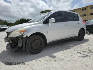 2010 Nissan Versa 1.8 SL with VIN 3N1BC1CP9AL445505, listed as a Copart auction lot 51128485 with 215,630 mi miles and Salvage Title. Bid and sale history available at carsss.com. Image 1.