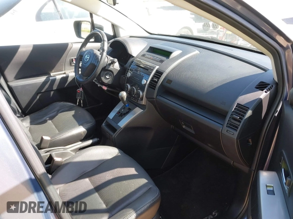 2008 Mazda 5 Grand Touring with VIN JM1CR293280324493, listed as a IAAI auction lot 42034944 with 83,166 mi miles and . Bid and sale history available at carsss.com. Image 5.