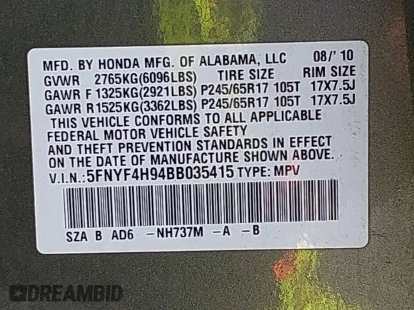 2011 Honda Pilot Touring with VIN 5FNYF4H94BB035415, listed as a IAAI auction lot 42126738 with 239,273 mi miles. Bid and sale history available at carsss.com. Image 9.