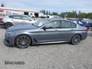2018 BMW 5 Series 540i z VIN WBAJE5C54JG917877, wystawiony jako IAAI lot #42235433 z przebiegiem 103 375 mil mil oraz . Historia ofert i sprzedaży dostępna na DreamBid. Obrazek 14.