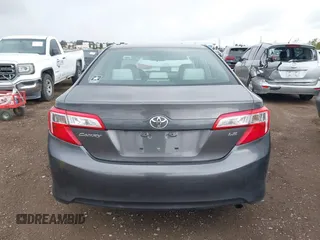 2014 Toyota Camry L with VIN 4T1BF1FK5EU403313, listed as a IAAI auction lot 42141338 with 185,925 mi miles and . Bid and sale history available at DreamBid. Image 16.