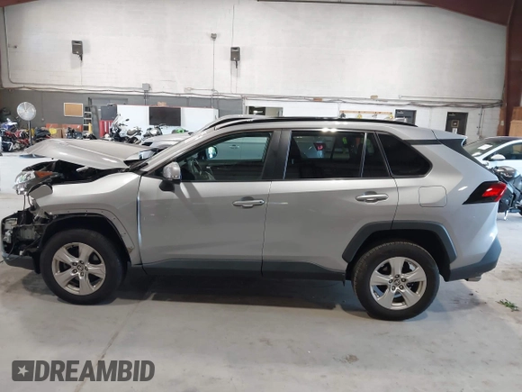 2021 Toyota RAV4 XLE with VIN 2T3P1RFV5MC180890, listed as a IAAI auction lot 42567858 with 56,961 mi miles and . Bid and sale history available at DreamBid. Image 13.