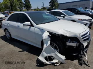 2014 Mercedes-Benz E 350 Sport with VIN WDDHF5KB8EA818290, listed as a Copart auction lot 62786005 with 128,327 mi miles and Salvage title. Bid and sale history available at DreamBid. Image 4.