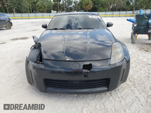 2003 Nissan 350Z Touring z VIN JN1AZ34E63T003086, wystawiony jako Copart lot #54011315 z przebiegiem 222 583 mil mil oraz Szkoda całkowita • Salvage title. Historia ofert i sprzedaży dostępna na DreamBid. Obrazek 5.