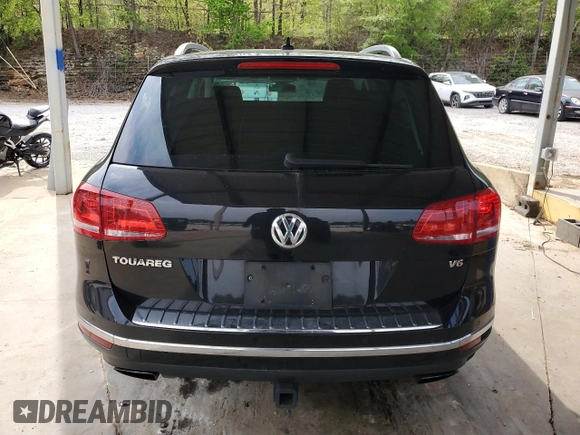 2016 Volkswagen Touareg Sport with VIN WVGEF9BP3GD007543, listed as a Copart auction lot 52806715 with 121,404 mi miles and Salvage Title. Bid and sale history available at DreamBid. Image 6.